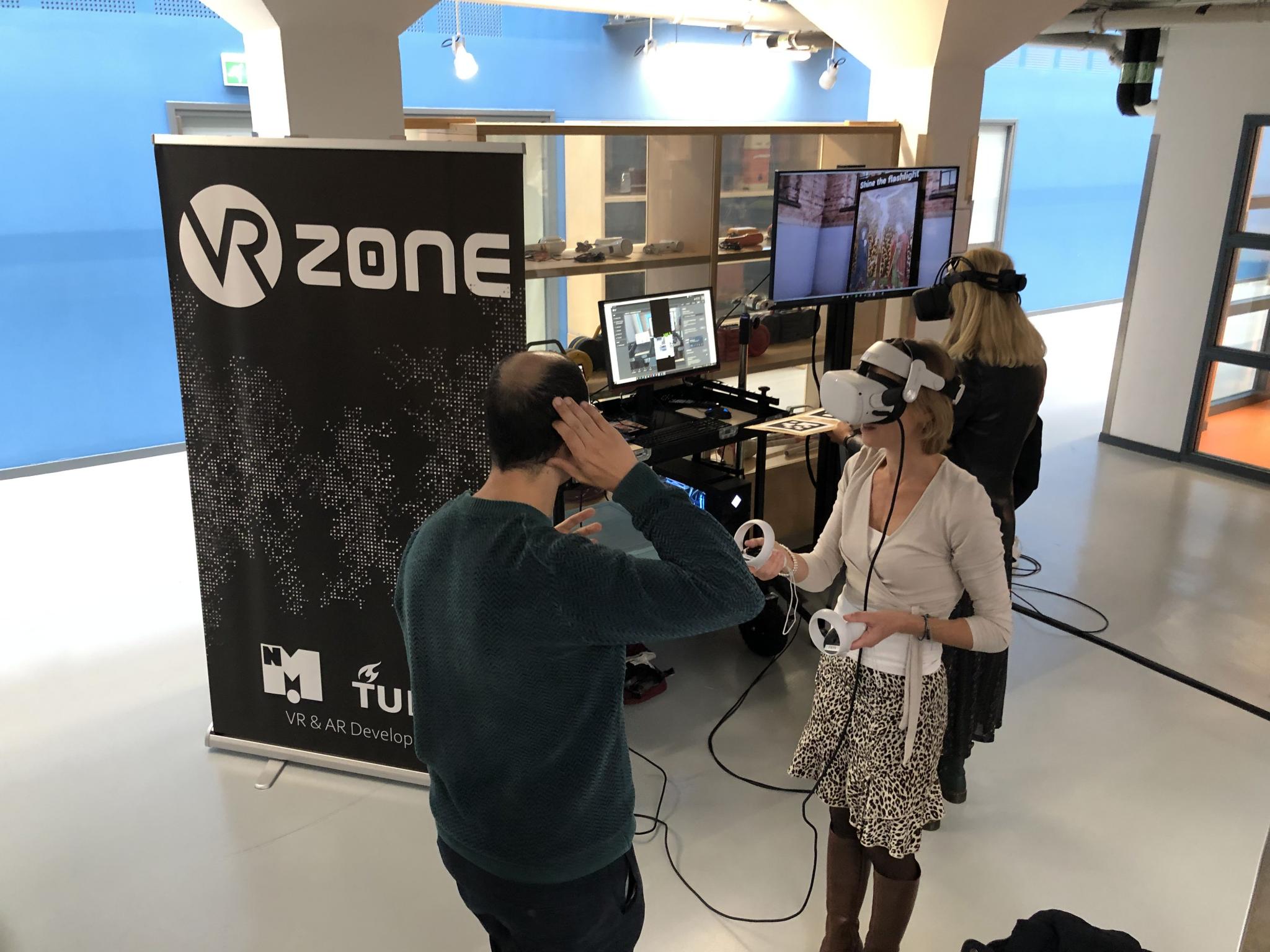 Workshop attendees trying VR from TU Delft VR Lab
